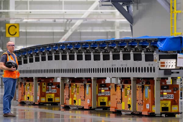 An automated material handling system for aircraft wings