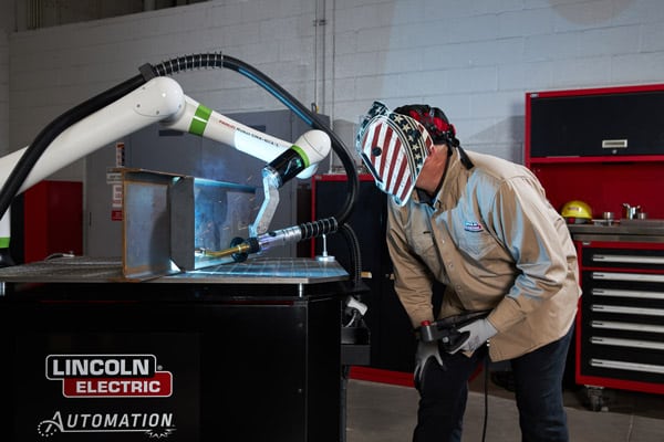 A collaborative robotic welder welding a component for the energy and power generation industry