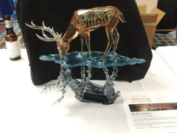A 3D-printed mirrored deer sculpture