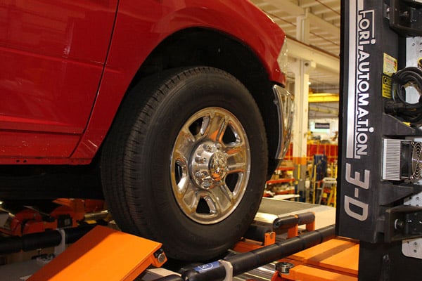 Automated end-of-line wheel alignment system
